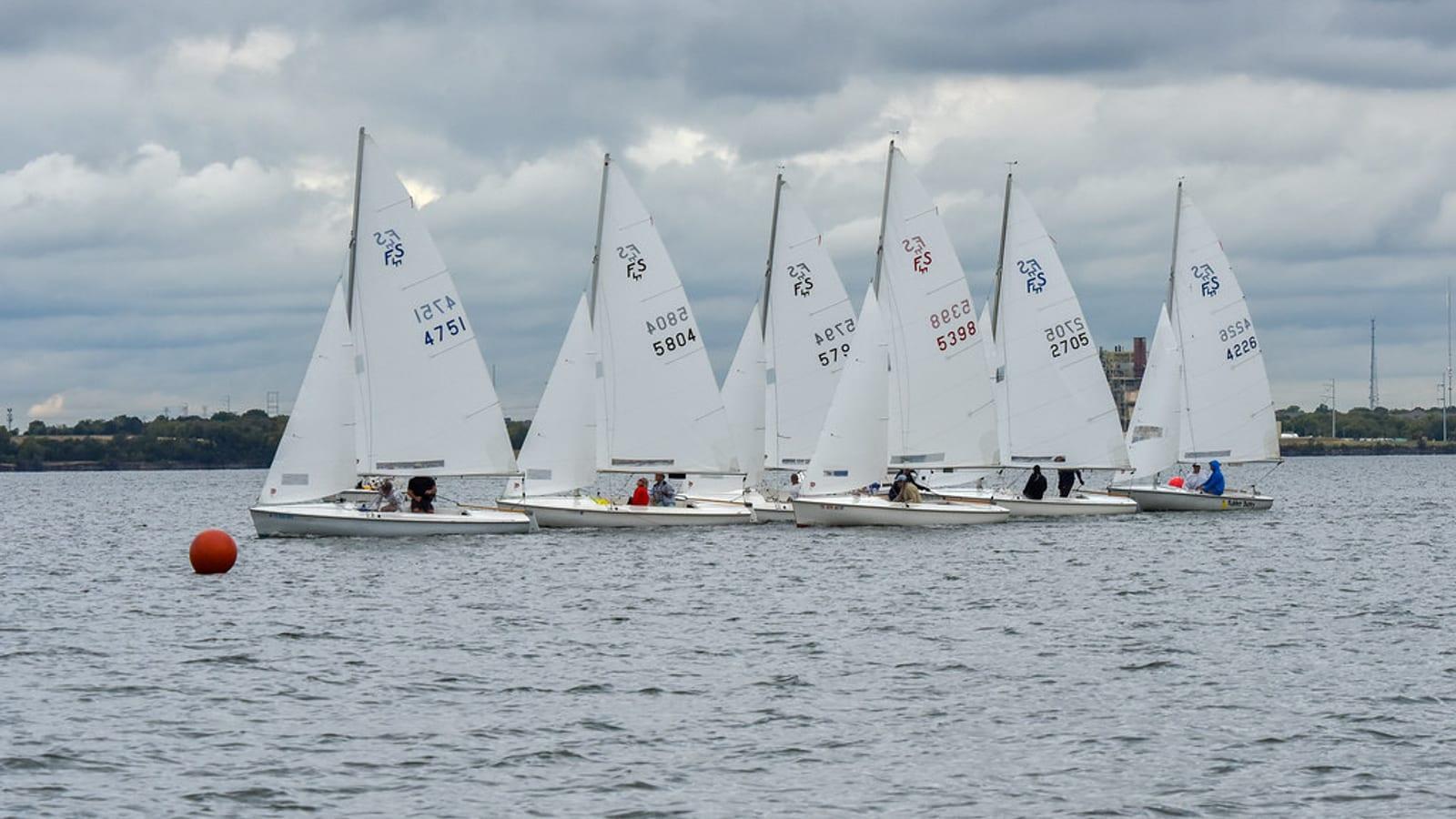 Dinghy fleet lined up before a start at Rush Creek Yacht Club
