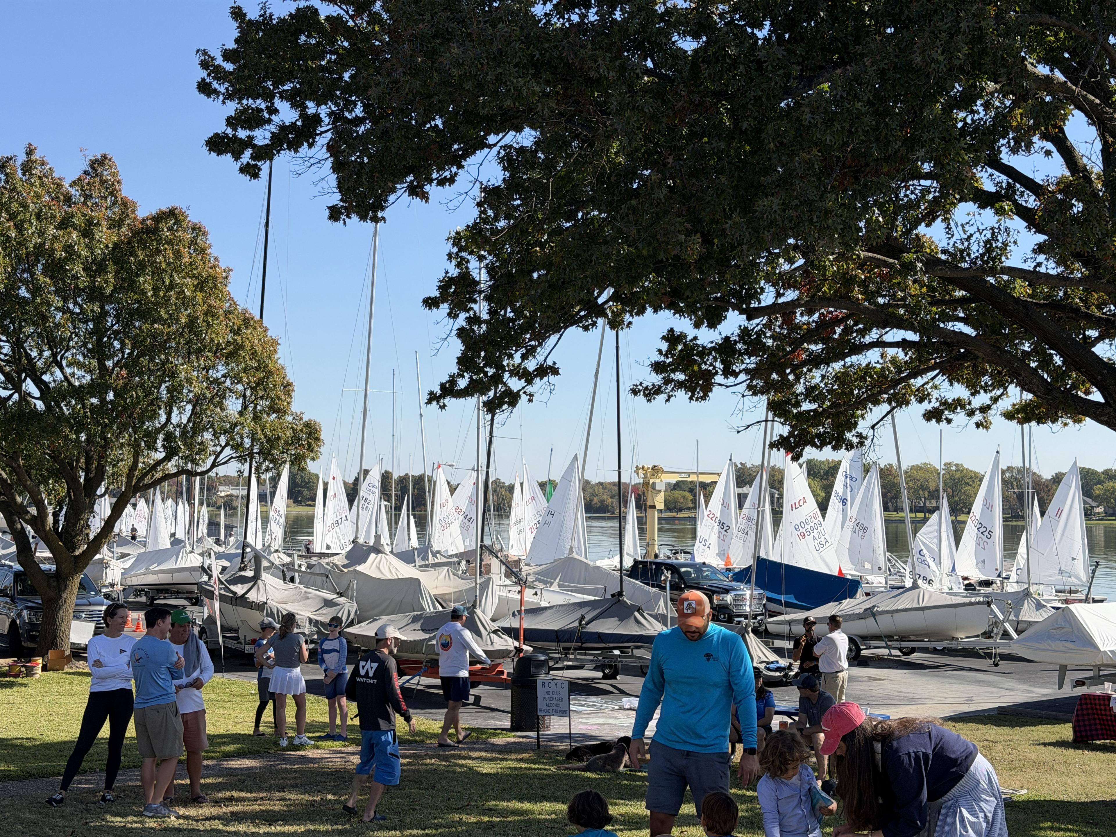 Large youth regatta fleet rigged on the Rush Creek Yacht Club shore