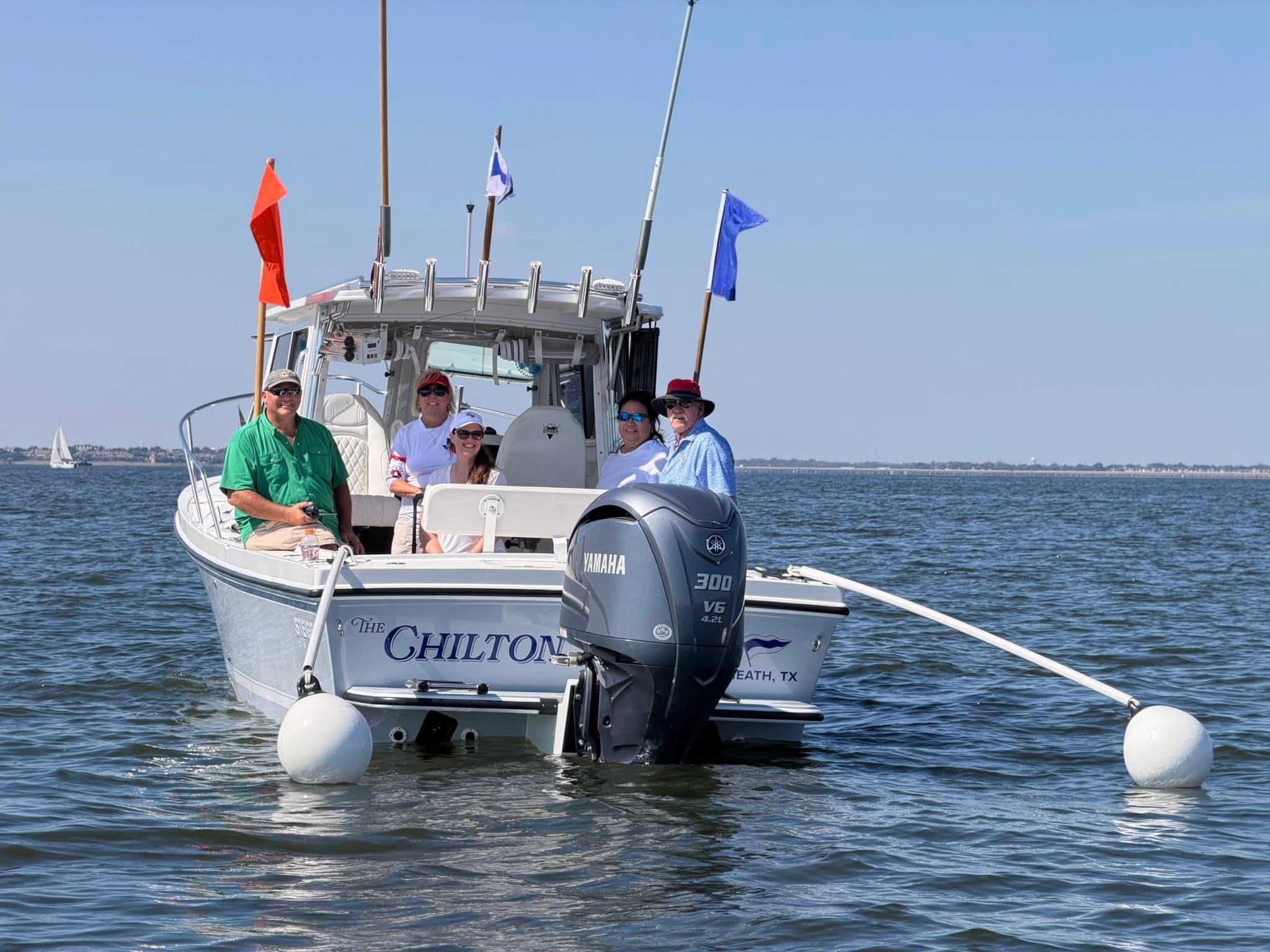 The Chilton race committee boat with volunteer crew on Lake Ray Hubbard