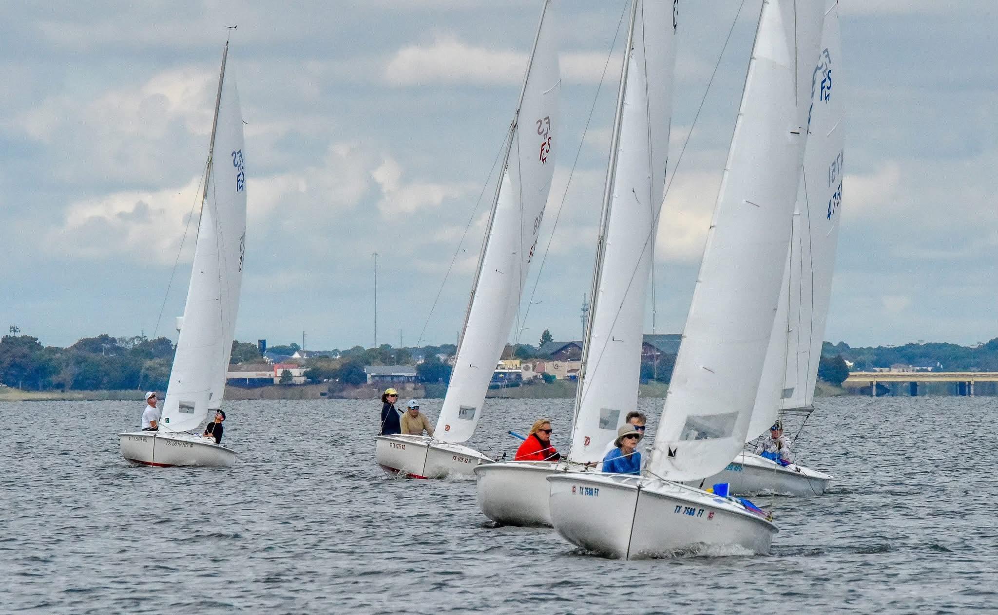 Flying Scot fleet racing in close action on Lake Ray Hubbard