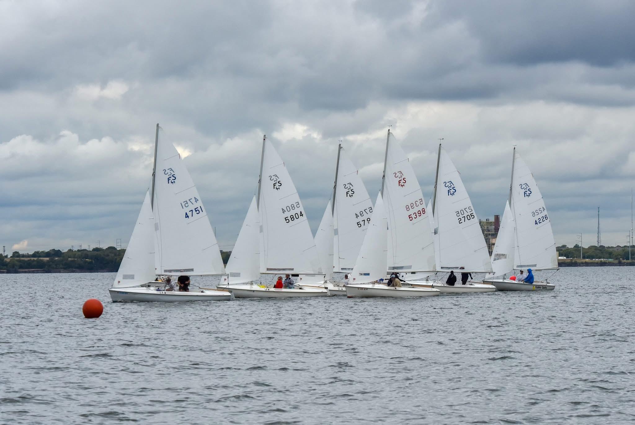 Flying Scot fleet at the start line on Lake Ray Hubbard