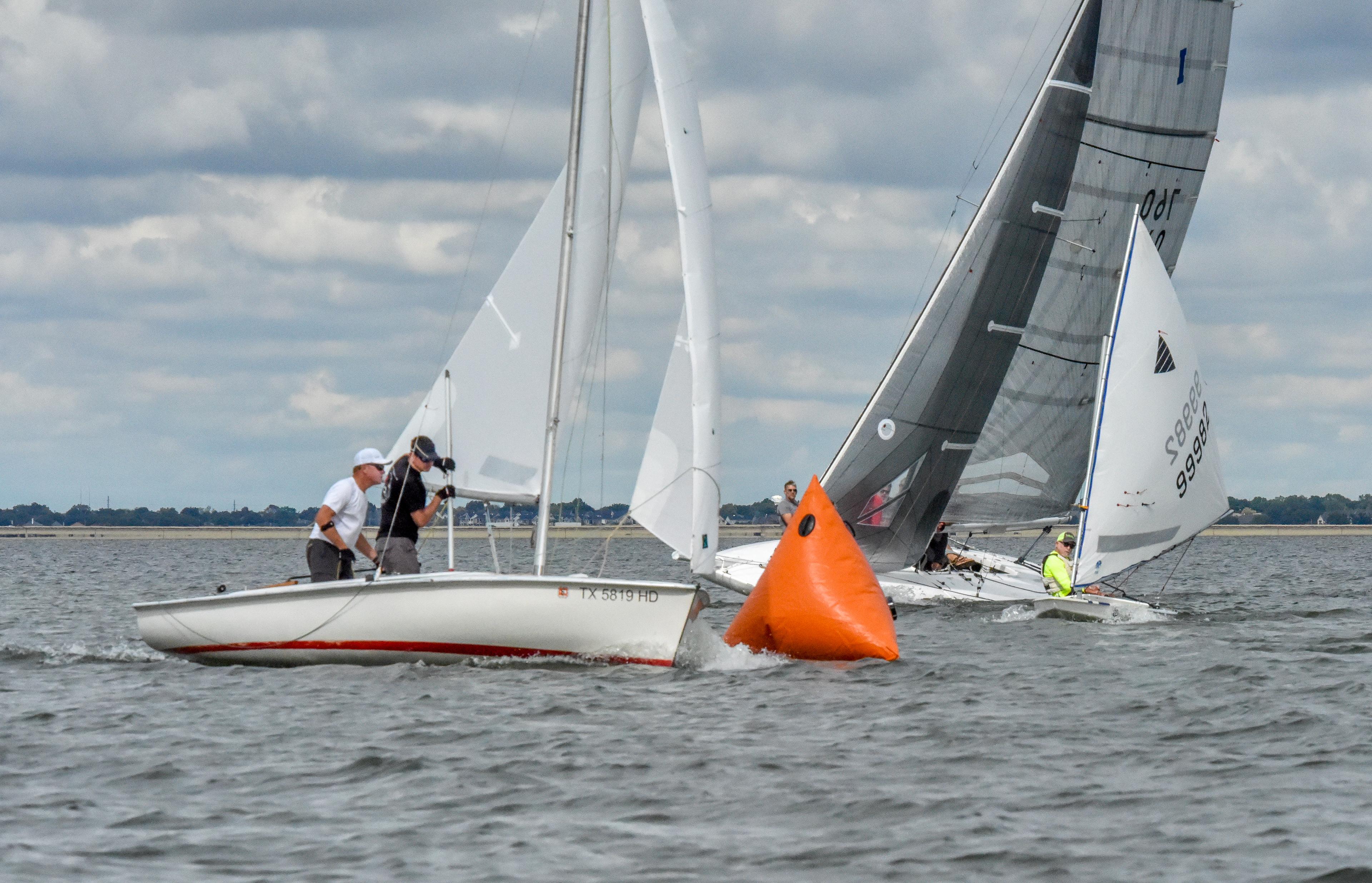 Two keelboats rounding a leeward mark at Rush Creek Yacht Club