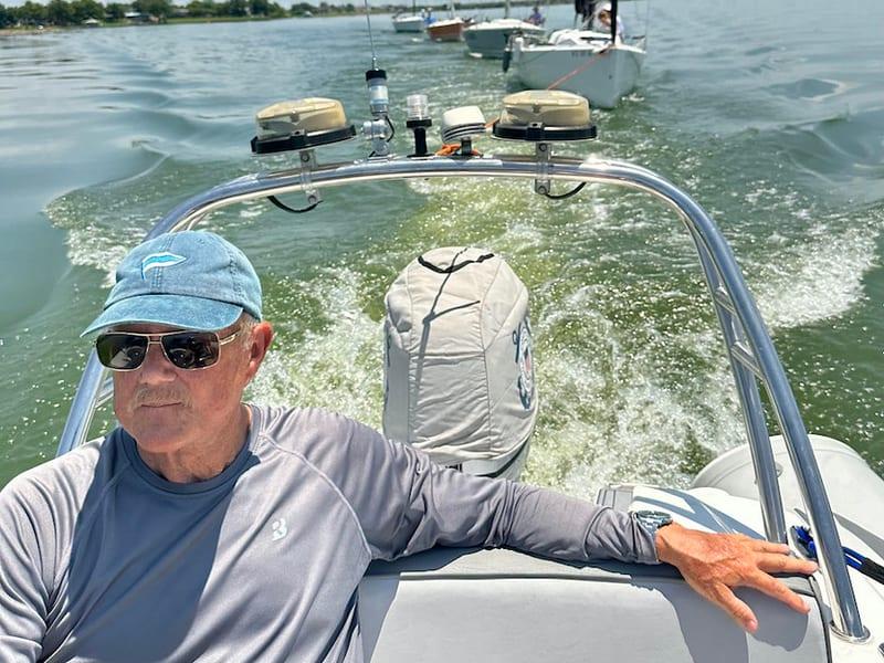 Race committee boat underway at Rush Creek Yacht Club