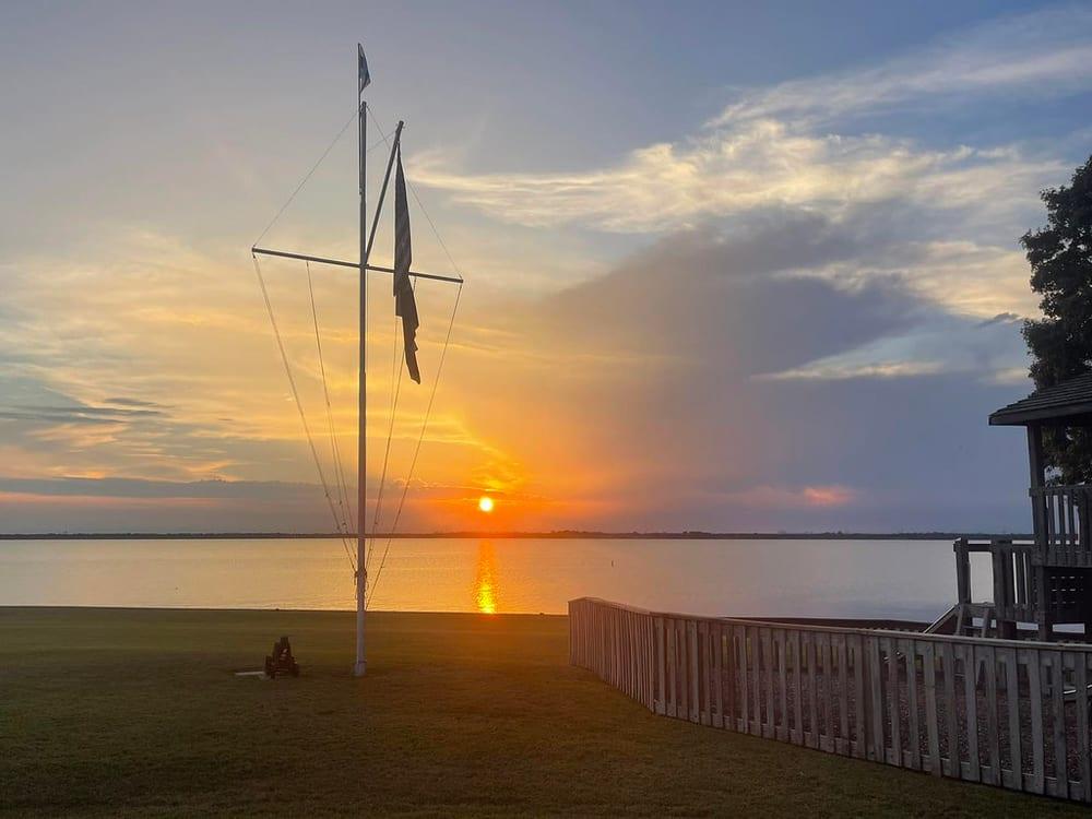 Sunset over the docks at Rush Creek Yacht Club