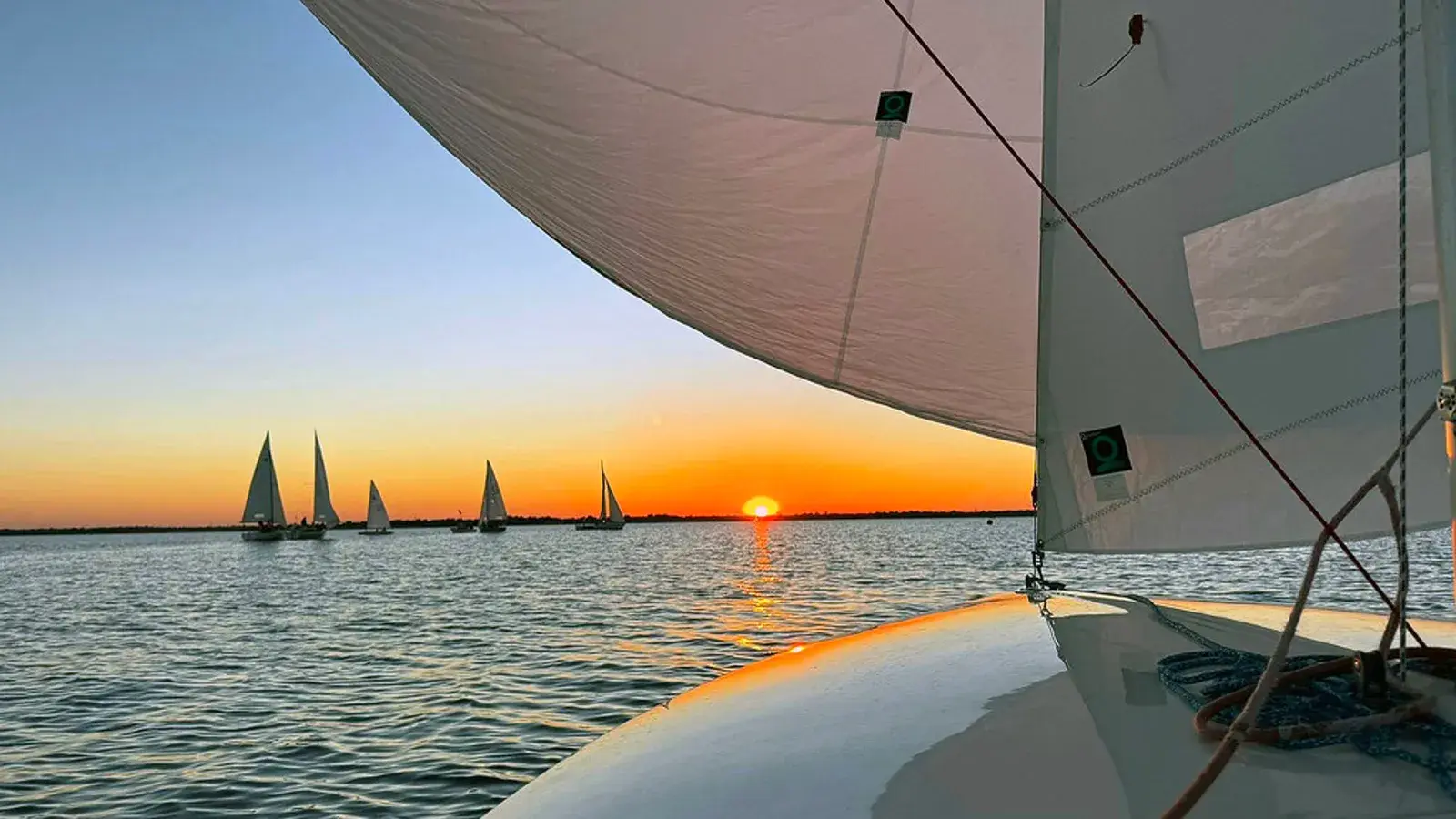 Sailboats silhouetted against the sunset on Lake Ray Hubbard