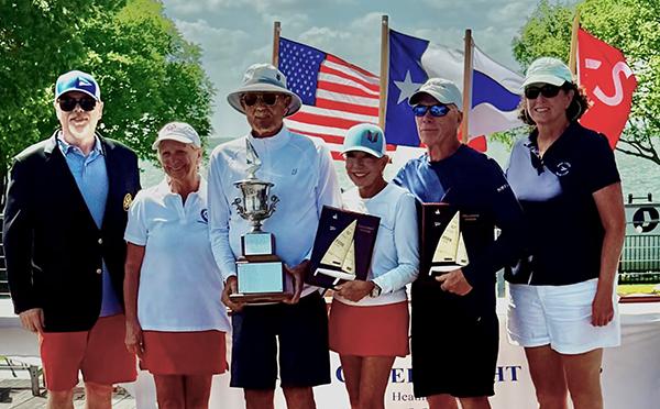 Trophy presentation ceremony with winners on the Rush Creek Yacht Club deck
